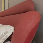 Wingback Leather Bed with Channel-Tufted Headboard and High-Gloss Wood Side Panels